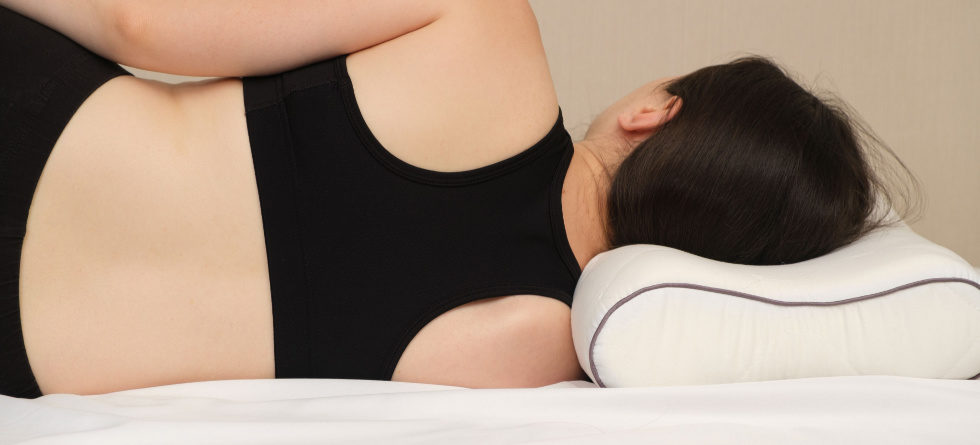 What is the best sleeping position for neck pain?